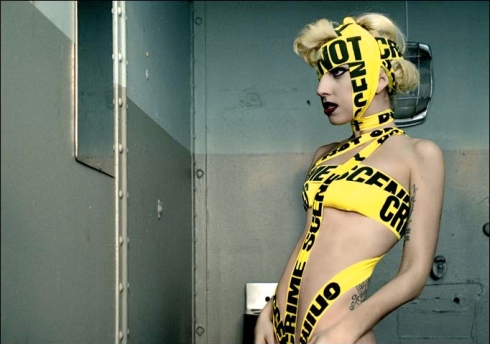  Lady GaGa was recently asked to remove her black and yellow tape outfit 